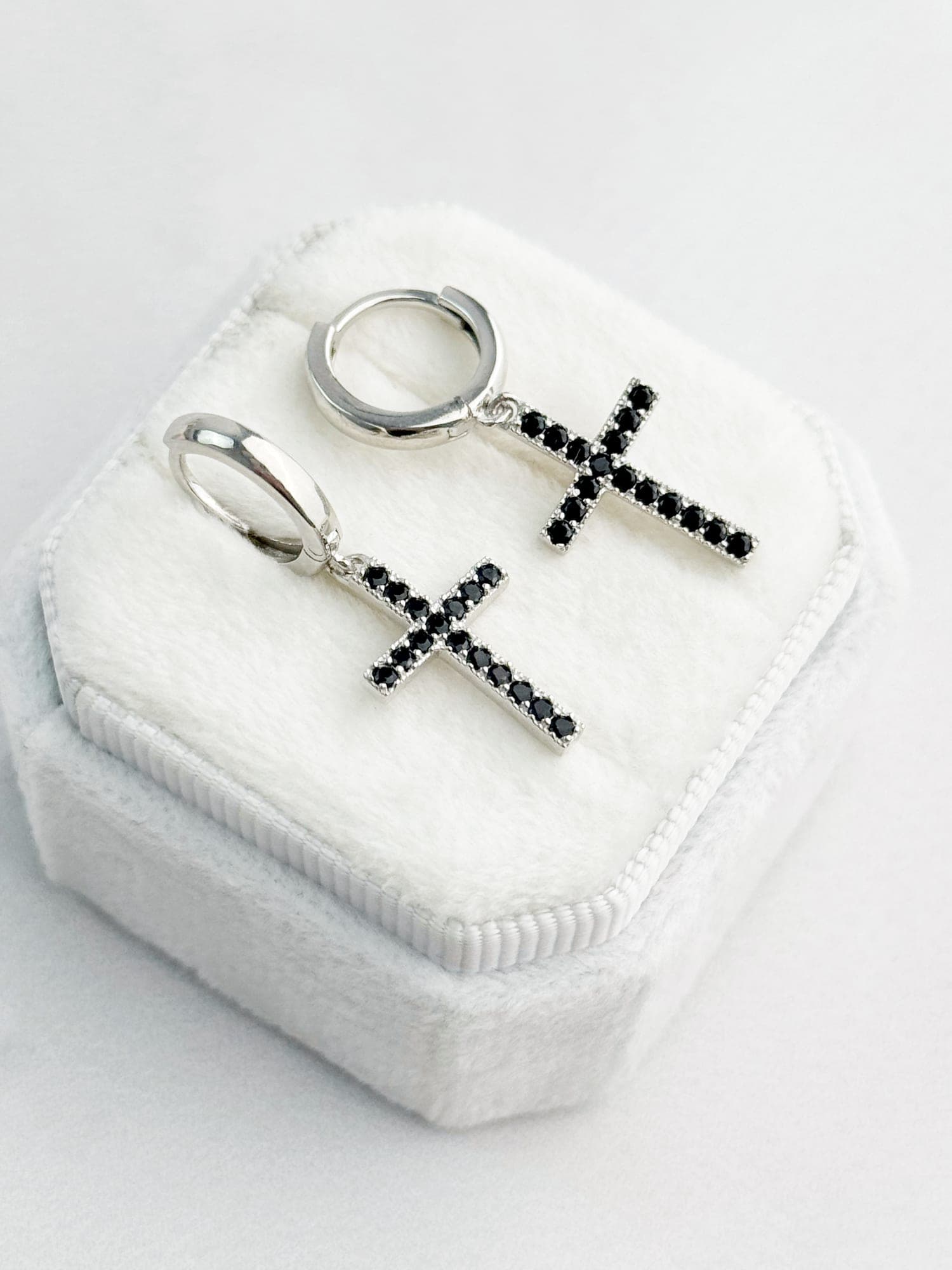 Silver “Cross” drop earrings with black cubic zirconia on hoops