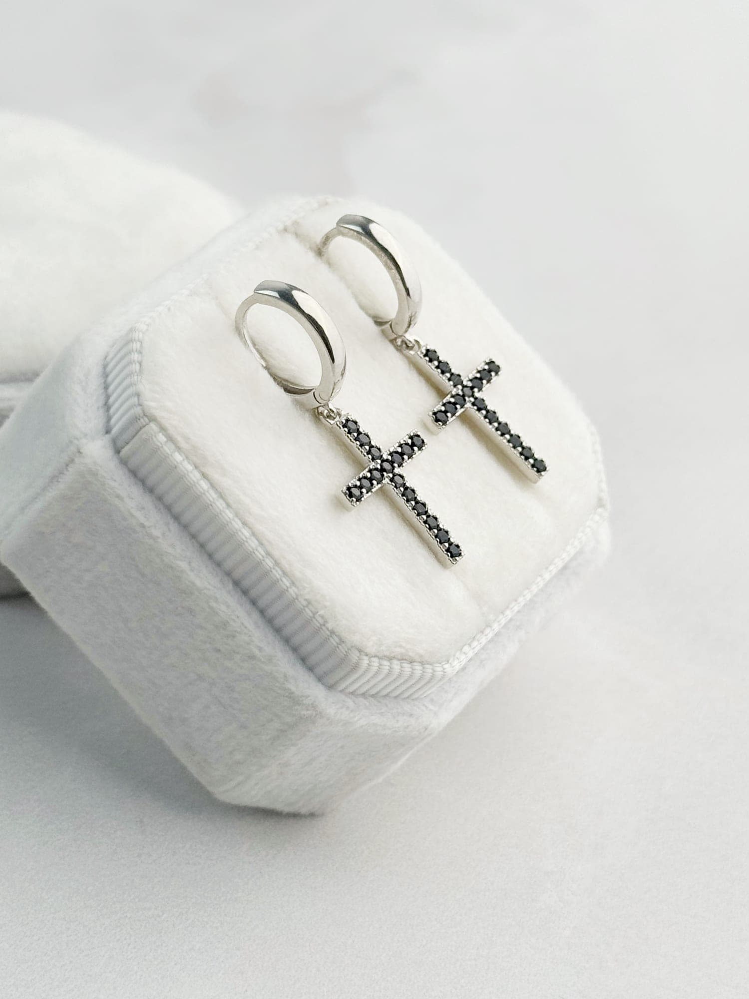 Silver “Cross” drop earrings with black cubic zirconia on hoops