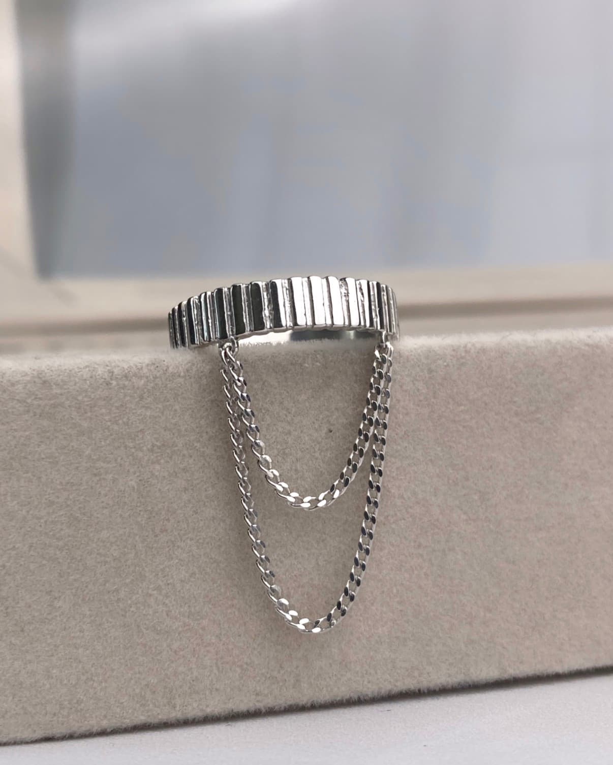 Silver ring with chains
