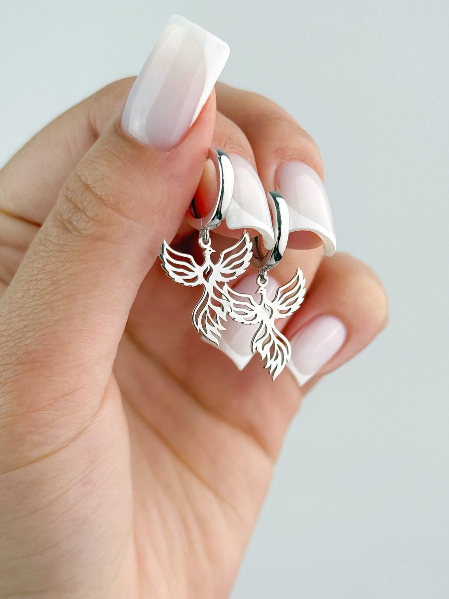 Серебряные серьги «Фениксы» на застёжке конго
