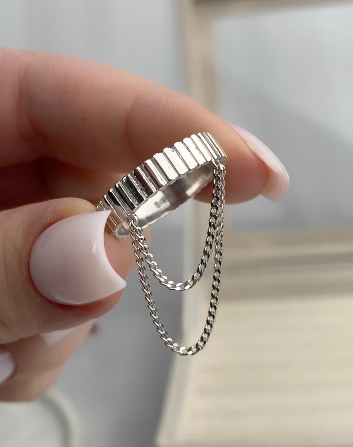 Silver ring with chains