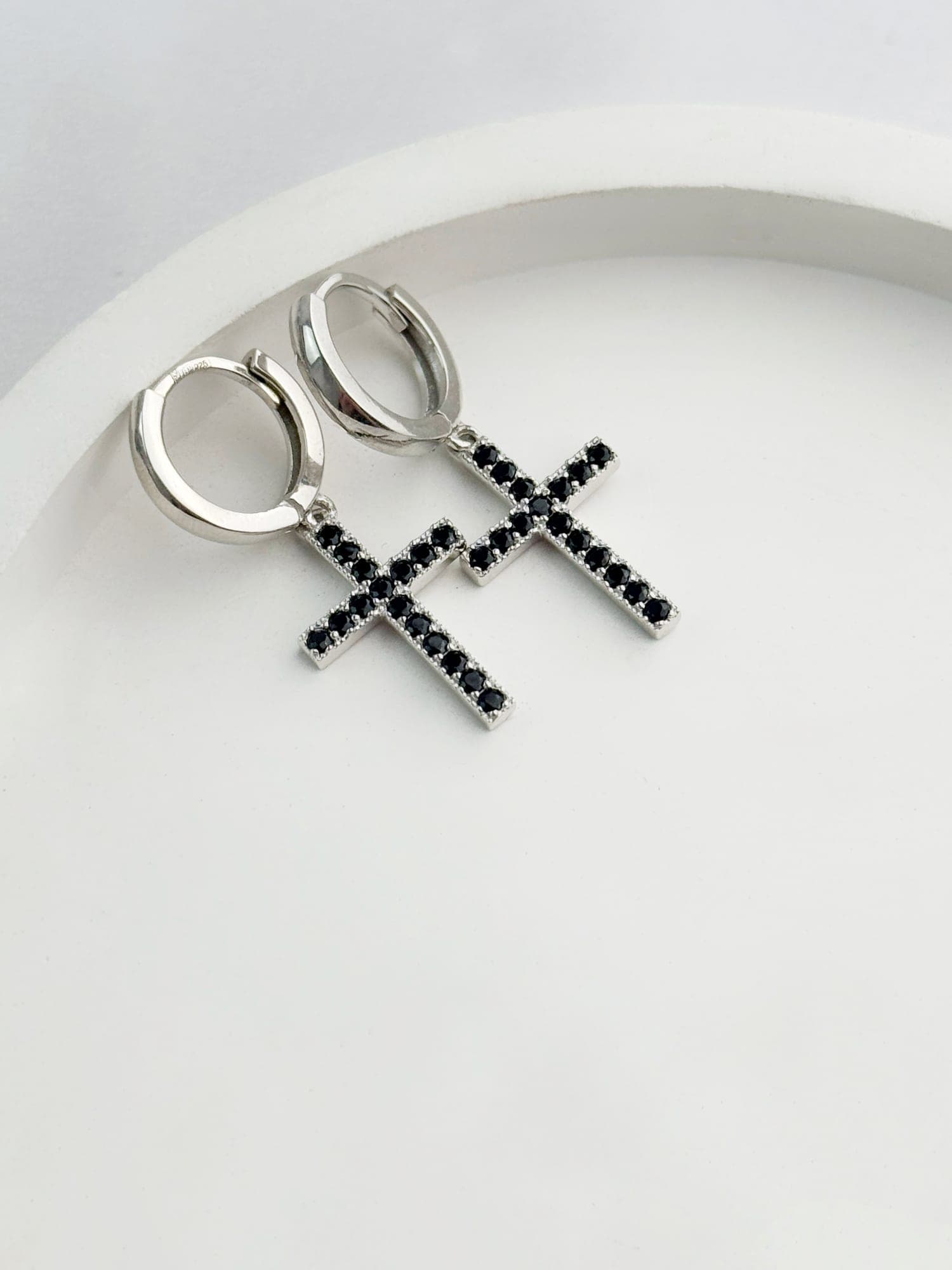 Silver “Cross” drop earrings with black cubic zirconia on hoops
