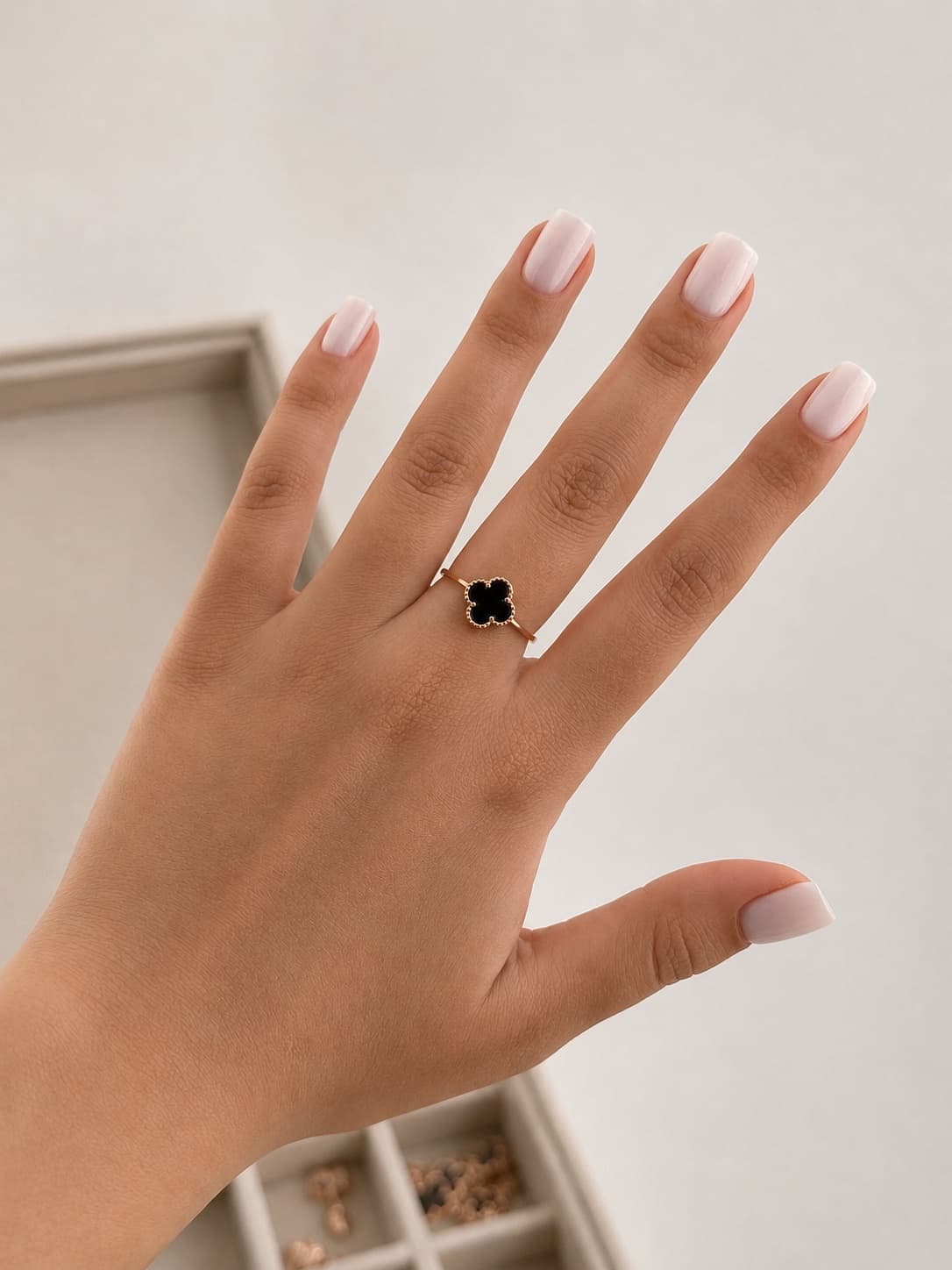 Gold-plated silver ring with a small clover and Cairo Night stone