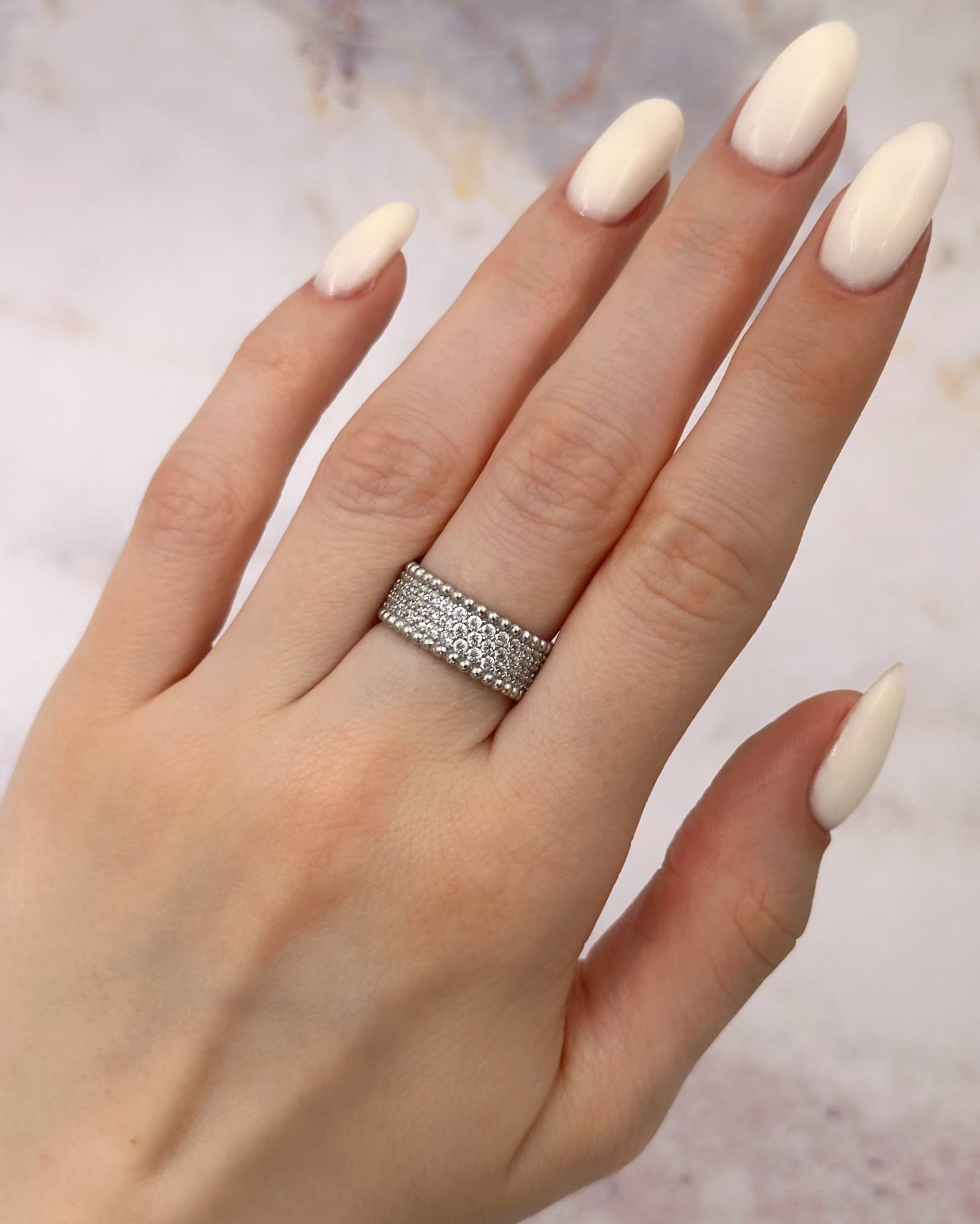 Wide silver ring with cubic zirconia