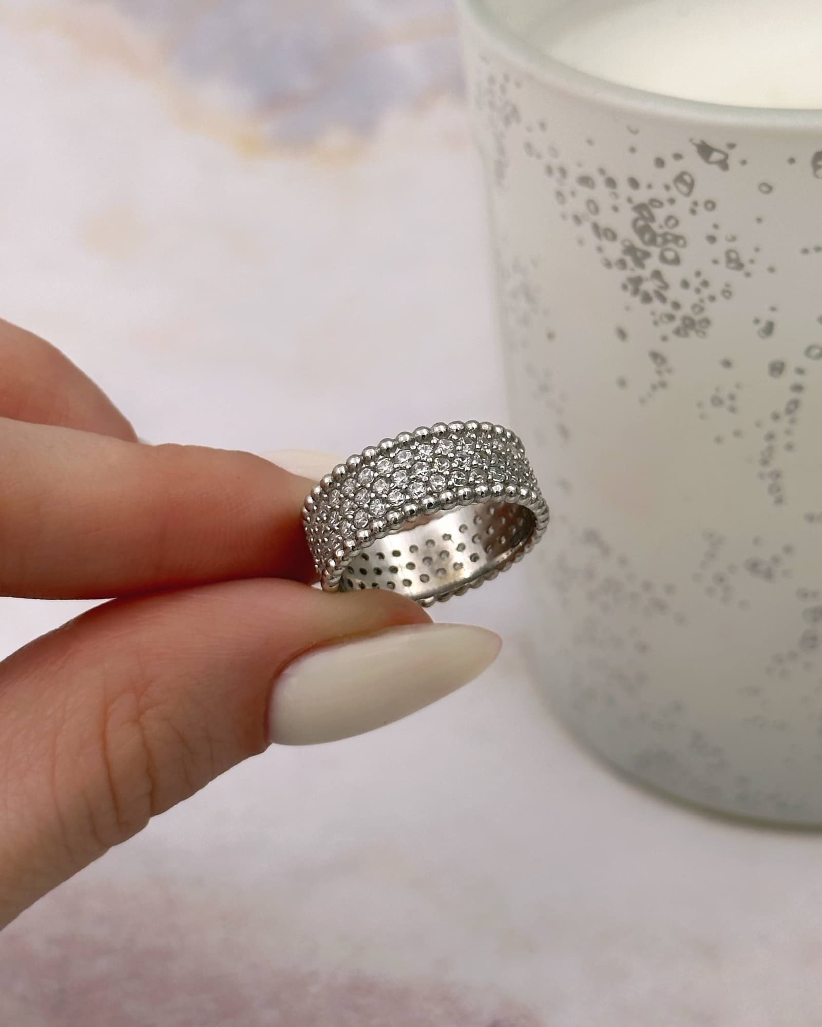 Wide silver ring with cubic zirconia