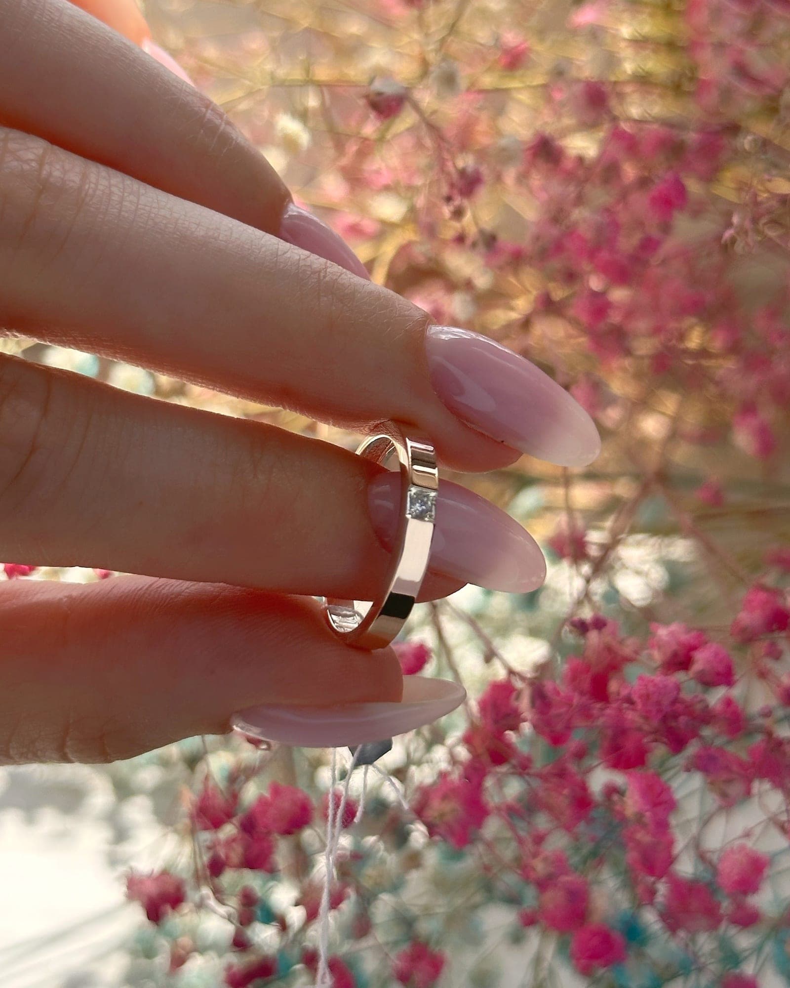 Silver ring with a 375 gold plate around the band and a cubic zirconia