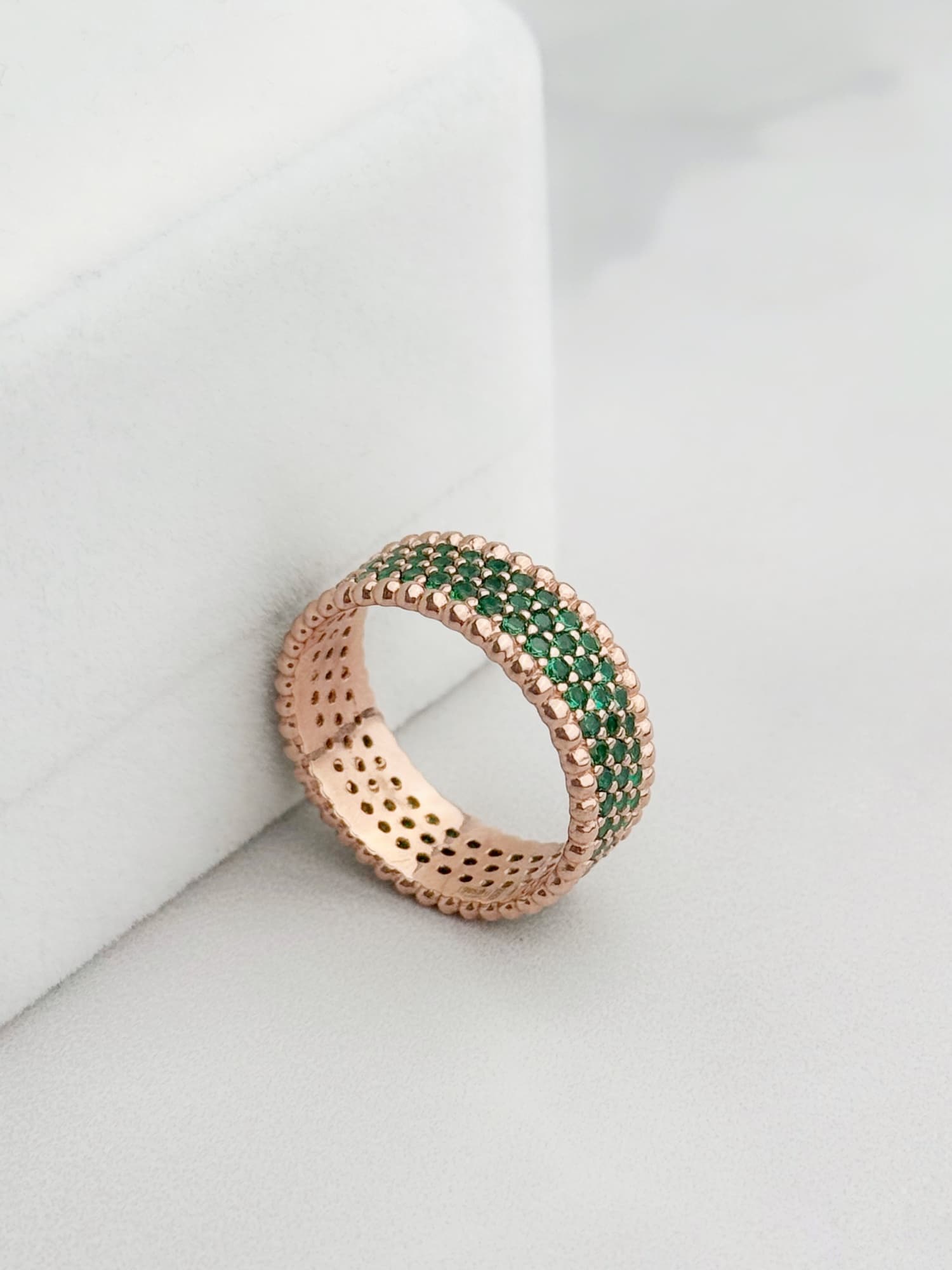 Wide gold-plated silver ring with green cubic zirconia