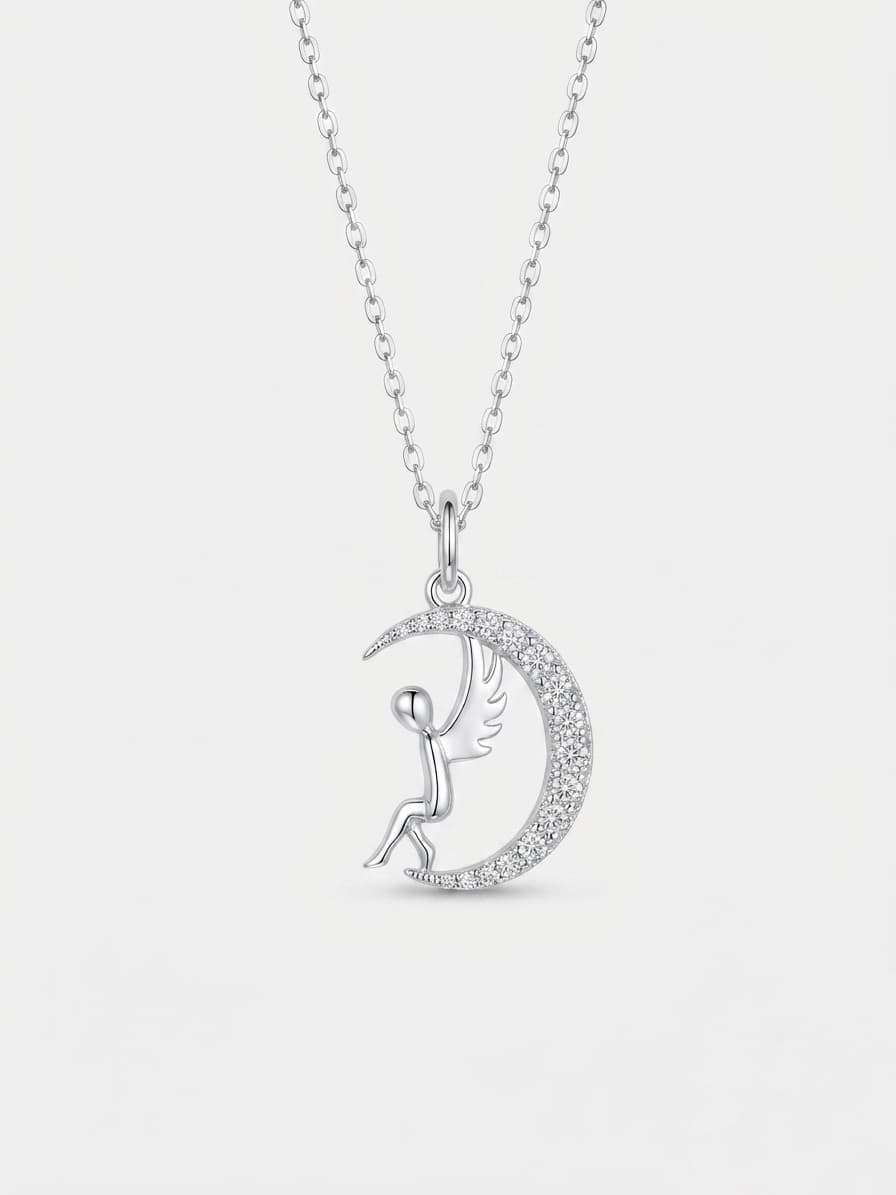 Silver necklace with an angel-on-the-moon pendant and cubic zirconia