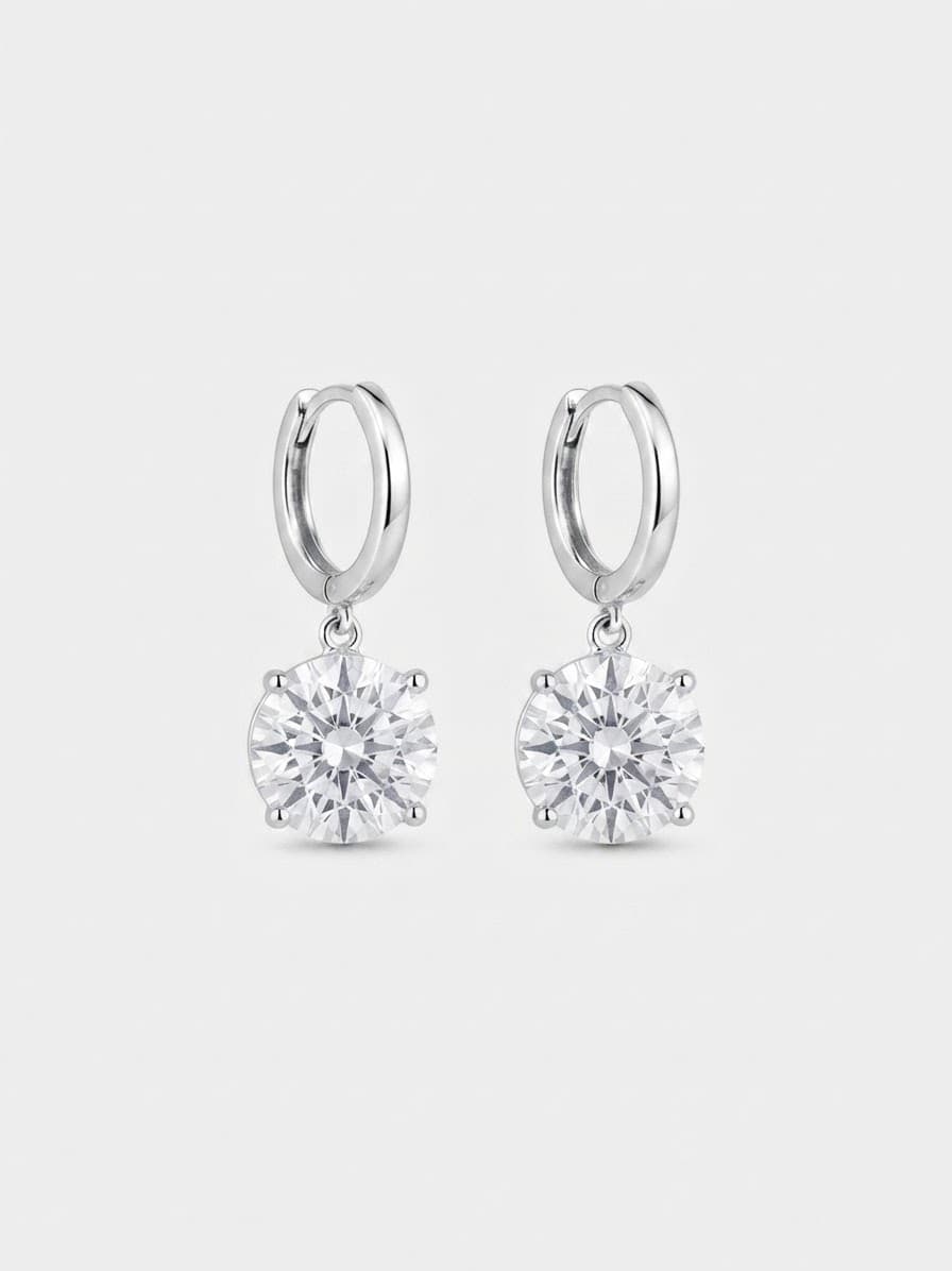 Silver earrings with round cubic zirconia drops on hoops