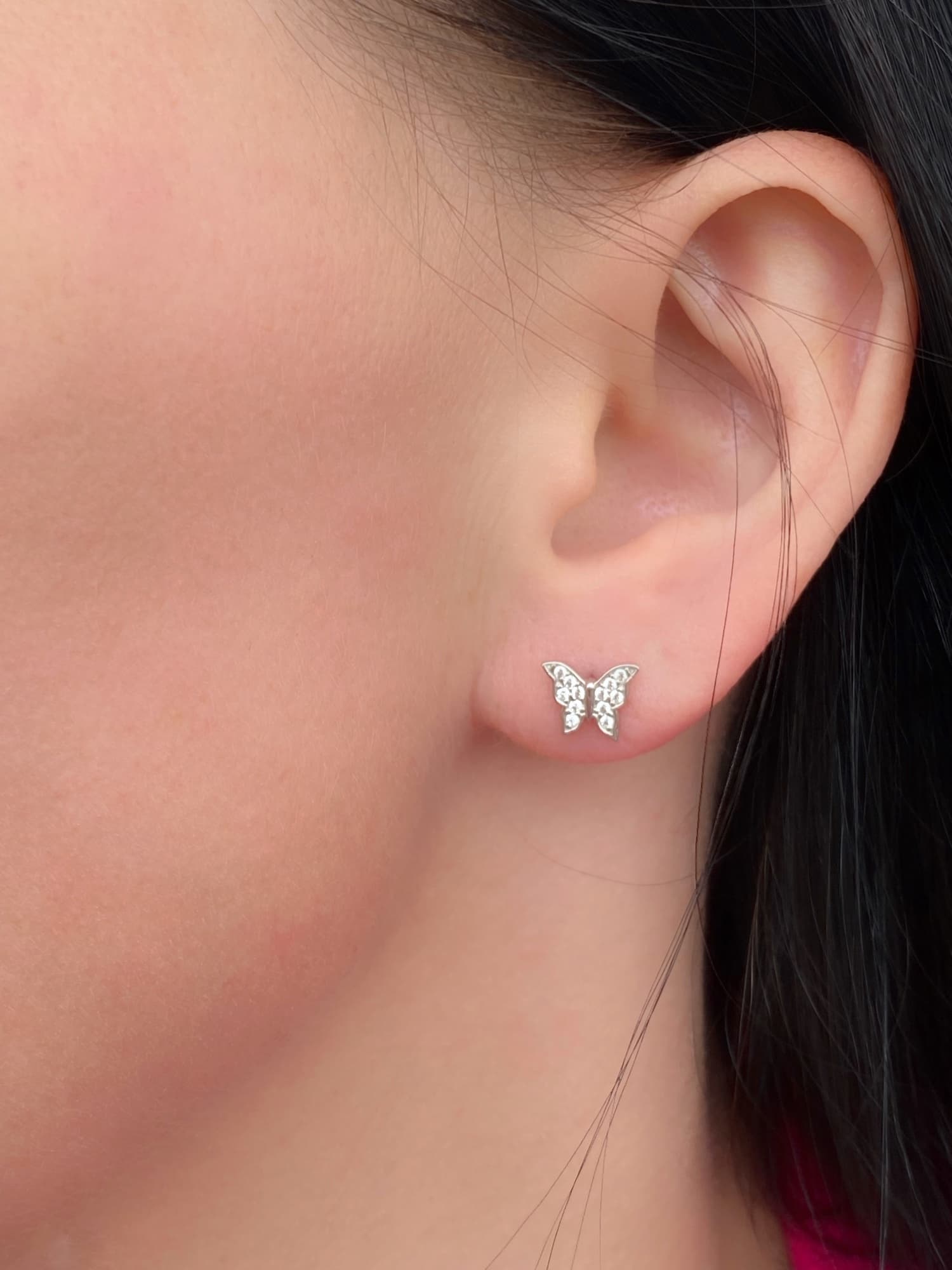 Rhodium-plated silver butterfly stud earrings with cubic zirconia