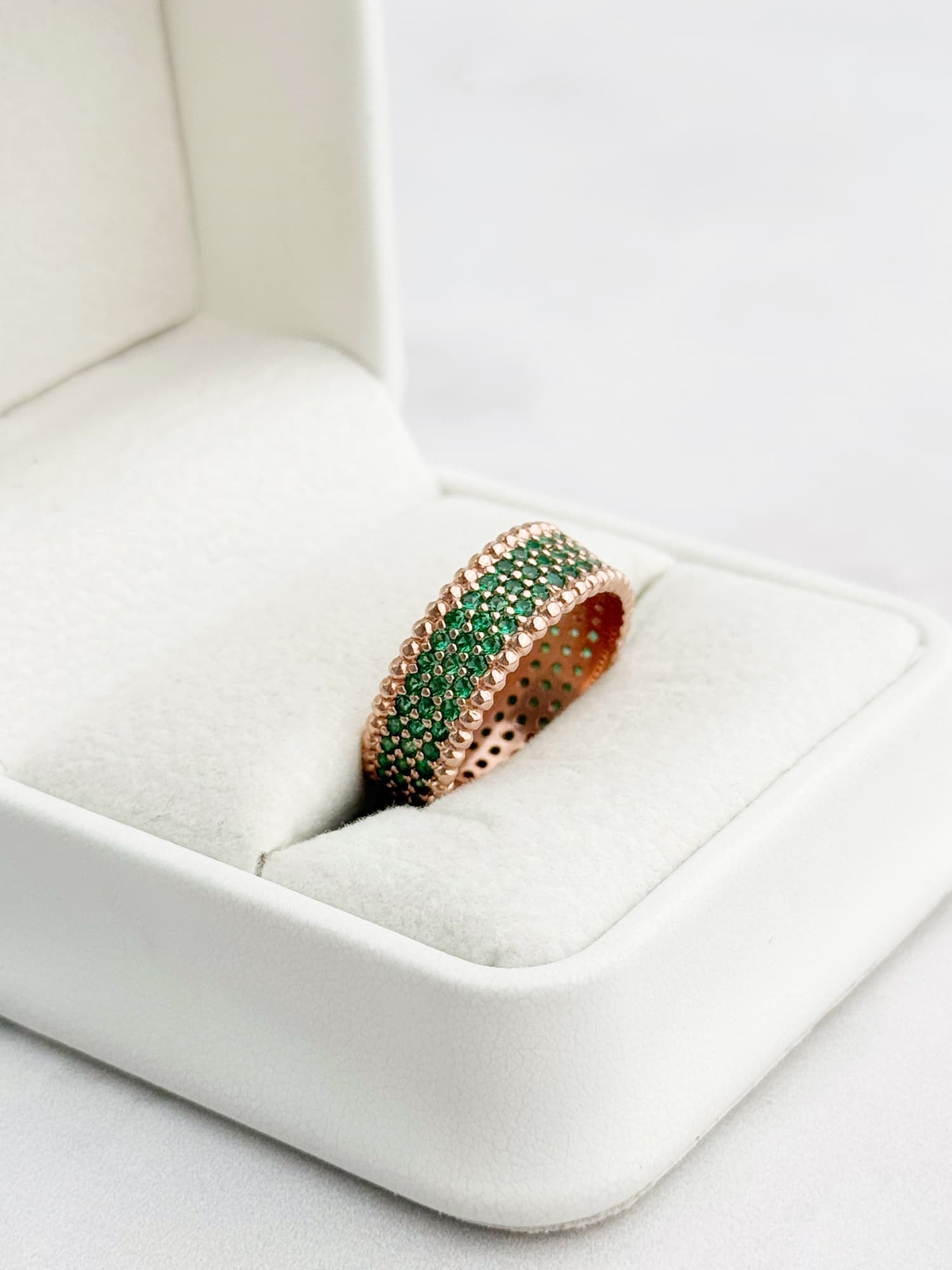 Wide gold-plated silver ring with green cubic zirconia