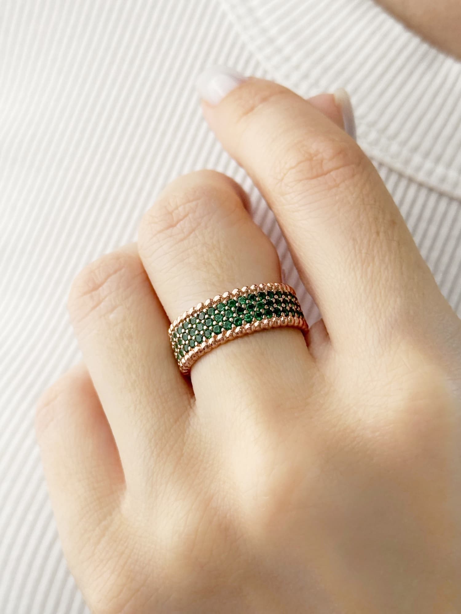 Wide gold-plated silver ring with green cubic zirconia