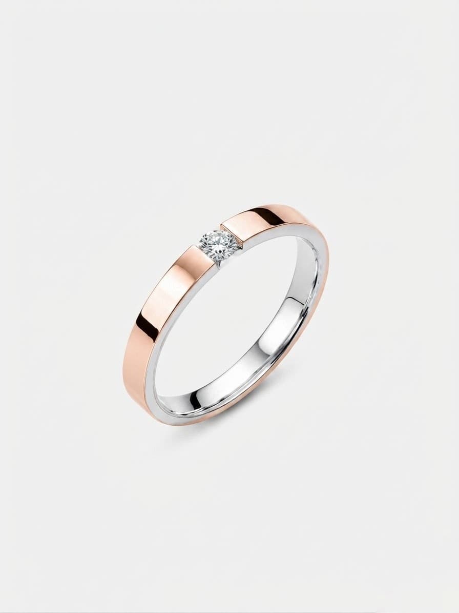 Silver ring with a 375 gold plate around the band and a cubic zirconia