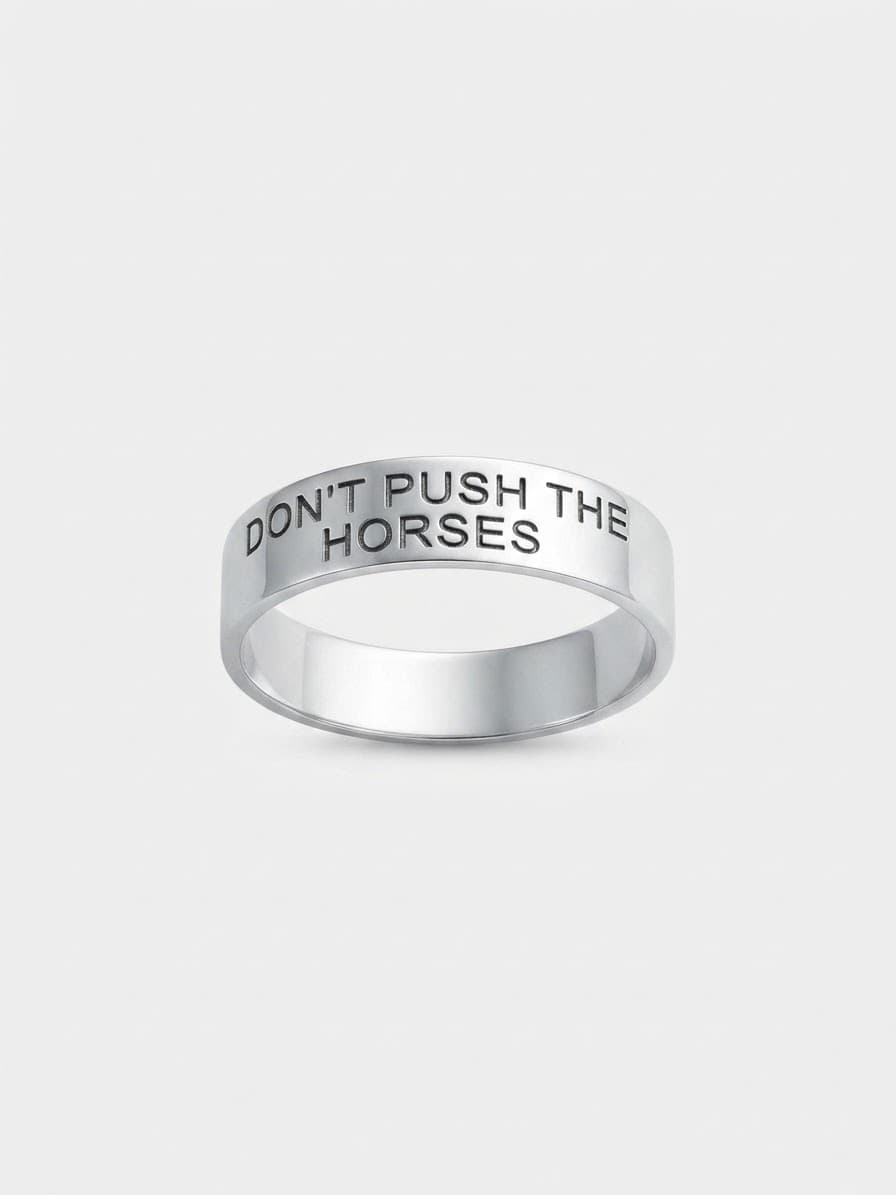 Wide men's silver ring engraved “Don't push the horses”