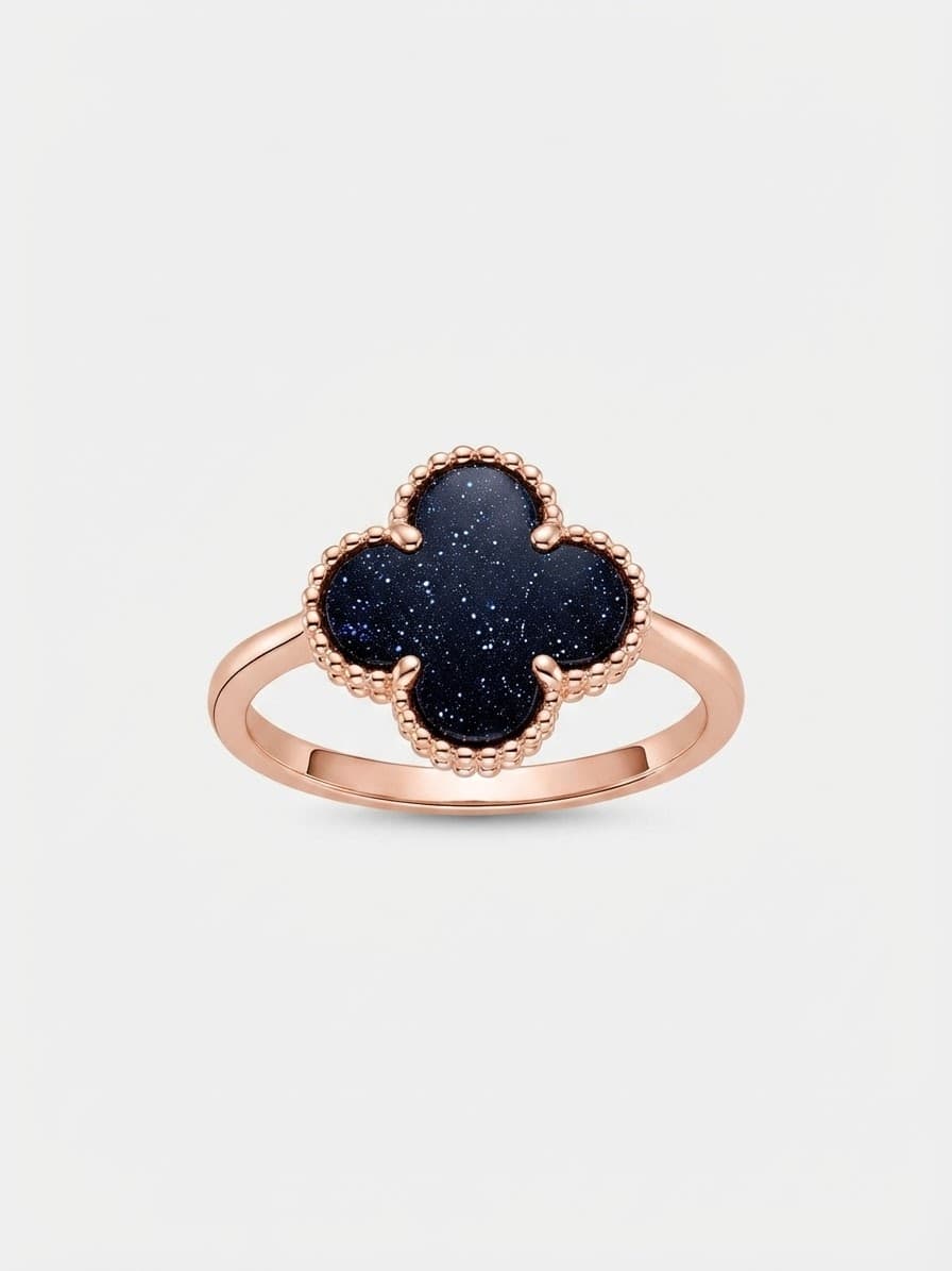 Gold-plated silver ring with a small clover and Cairo Night stone