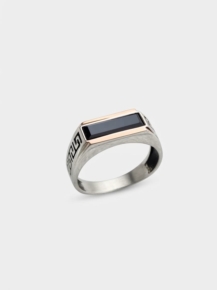 Silver signet ring with 375 gold plates, black onyx and oxidation