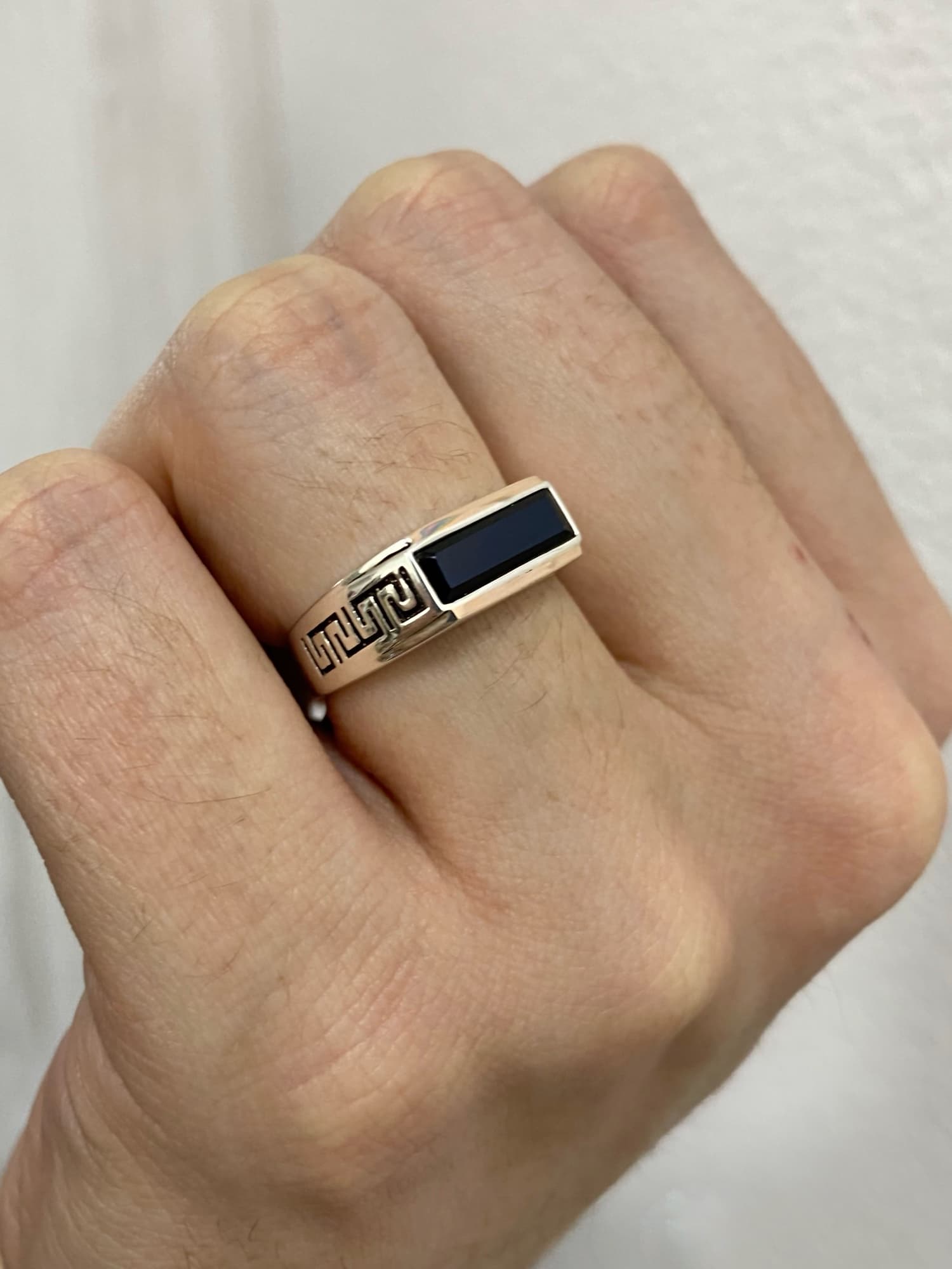 Silver signet ring with 375 gold plates, black onyx and oxidation