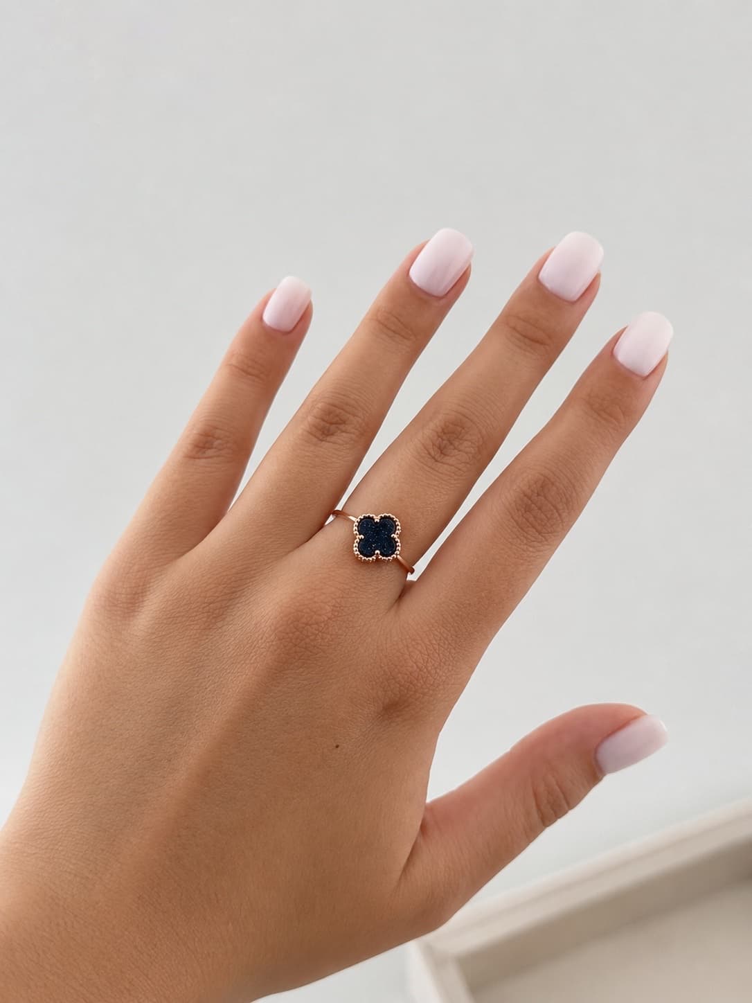 Gold-plated silver ring with a small clover and Cairo Night stone