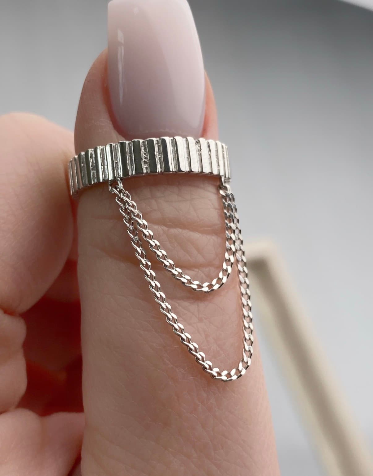 Silver ring with chains